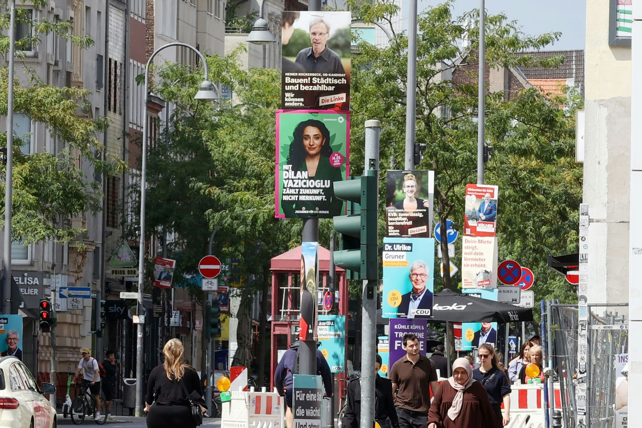 Straßenwahlkampf: In Köln gibt es vor der Wahl viel gute Laune und ein paar Pöbeleien