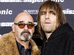 „Wir sehen dich in Südamerika“: Oasis-Gitarrist unterbricht Tour wegen Krebs